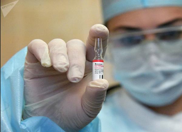 A medical worker of the Minsk city polyclinic No. 28 vaccinates volunteers against COVID-19 with a Russian Sputnik V vaccine