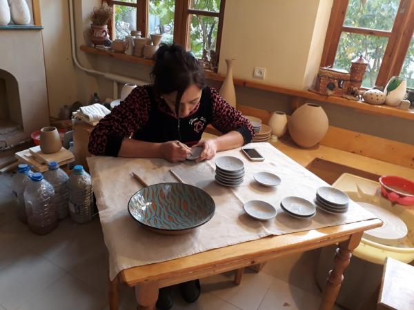 Young artist at work at the Rakhimov's Workshop